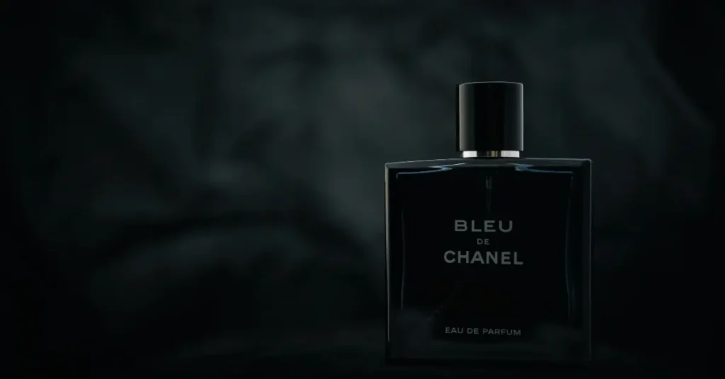 black bottle of bleu de chanel in the dark