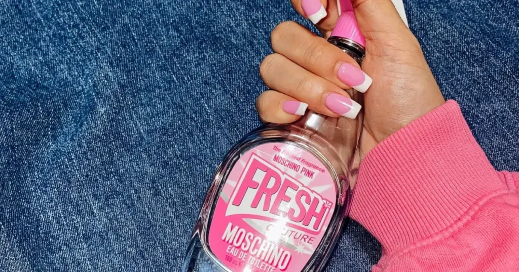 Moschino perfume spray bottle in a Windex from in pink